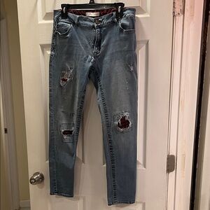 Distressed Blue Jeans with Red and Black Checkered Accents